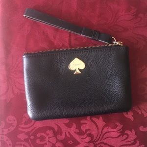 Pebbled leather wallet with wristlet handle